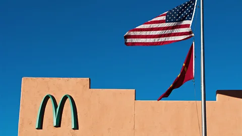Alamy Though McDonald’s is very protective of its logo, the company has been willing to alter its colour to conform to local building codes around the world (Credit: Alamy)