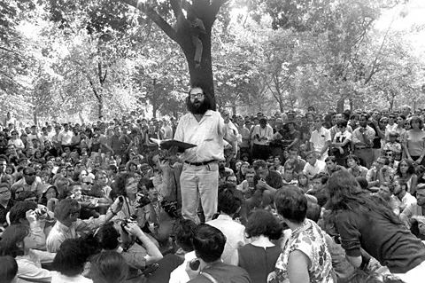 Getty Images Ginsberg reading his work in New York's Washington Square Park in the 1960s – with Howl he became a counterculture icon (Credit: Getty Images)