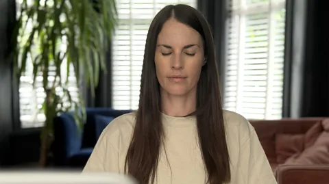 Melissa Hogenboom Health correspondent Melissa Hogenboom sitting calmly during a breathing exercise (Credit: Melissa Hogenboom)