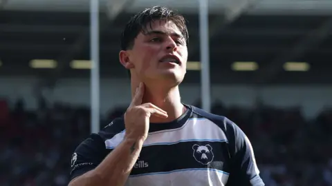 Louis Rees-Zammit poses after scoring the first of his two tries for Bristol Bears against Northampton Saints