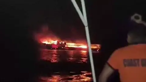 Burning boat in Philippines