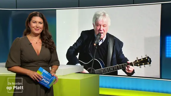De Noorden op Platt: Vanessa Kossen im Studio vor einer Einblendung mit Rolf Zuckowski.