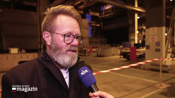 Wirtschaftsminister Madsen im Interview.