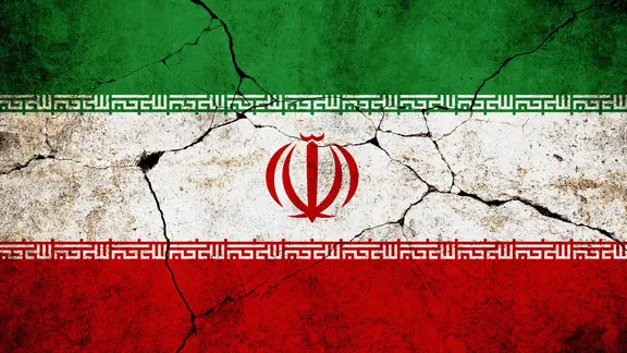 Rissige und verwitterte iranische Flagge