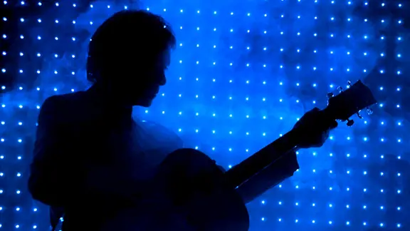Die Silhouette eines Musikers