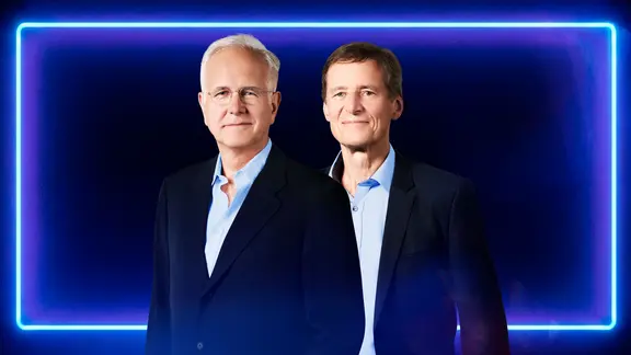 Harald Schmidt und Prof. Ulrich Hegerl vor dunkelblauem Hintergrund mit leuchtendem Rahmen.