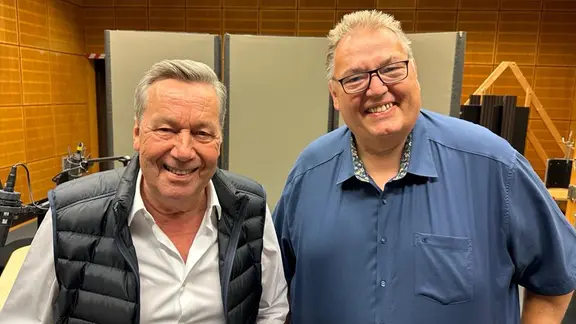 Schlagersänger Roland Kaiser und Moderator Michael Thürnau