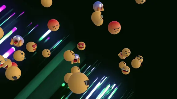 Viele verschiedene Smileys und Emojis flattern durch einen virtuellen Raum