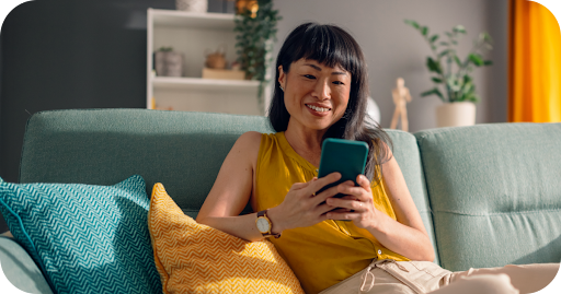 Image of woman using Google Pixel phone and Google Home app