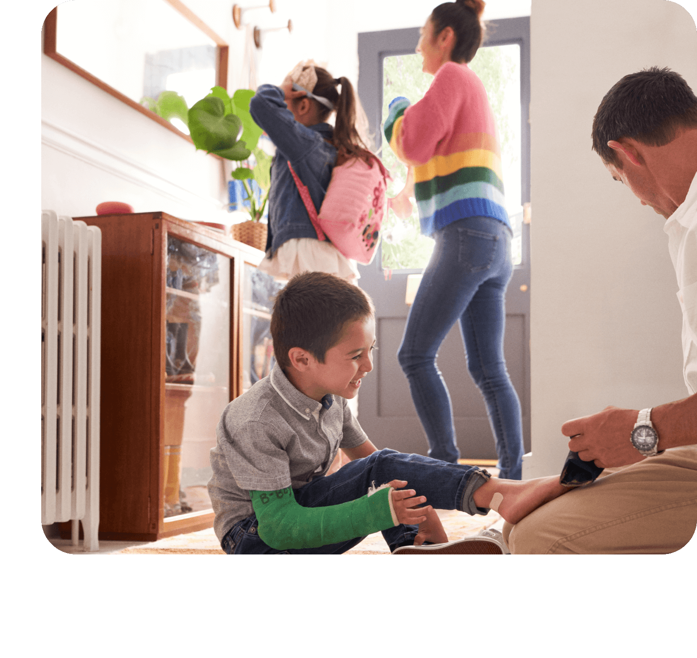 mother getting kids ready for activities with google calendar to help with planning