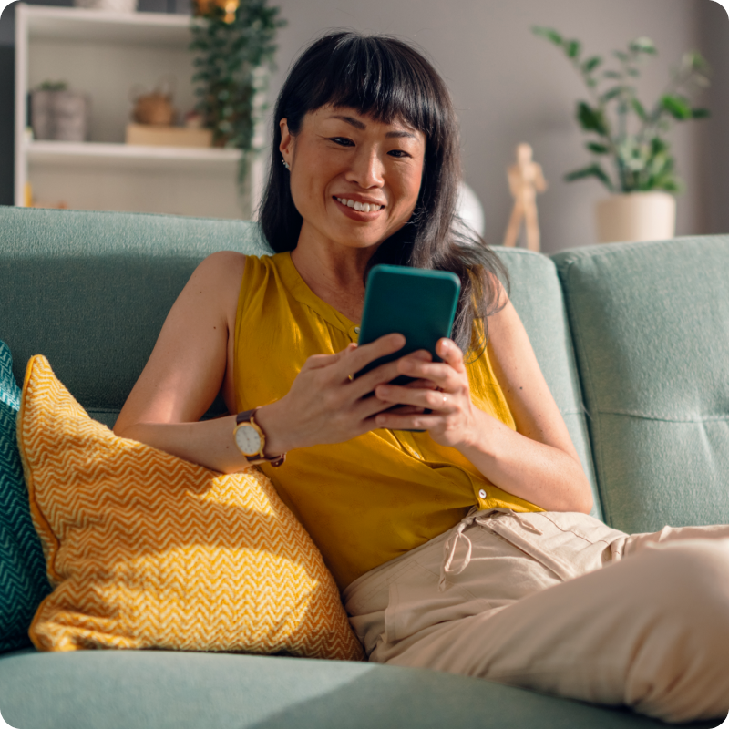 Image of woman using Google Pixel phone and Google Home app