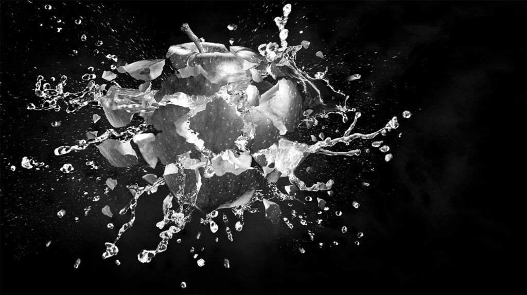 Exploding apple in black and white 1