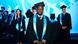 A male graduate of International Media Studies at the graduation ceremony of the University of Bonn in cape and graduate hat.