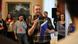 Martin Scott presents a report in front of a crowd