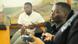A young man speaks into a microphone while at a mining school in Zambia