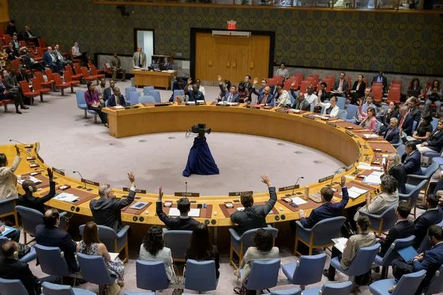 Members of the UN Security Council vote during a meeting at United Nations Headquarters in New York.
