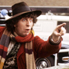 tozka: the Fourth Doctor pointing accusingly at someone off-screen (doctor who fourth hey)
