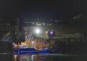 A group of people thought to be migrants are brought in to a marina in Gosport, by the RNLI following a small boat incident in the Channel. Picture date: Sunday October 4, 2026.