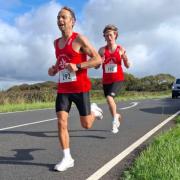Gary Marshall, left, won the 2025 edition of the Isle of Wight Marathon