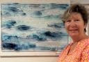 Sue Tinkler won the People's Choice award for her glass panel All At Sea.