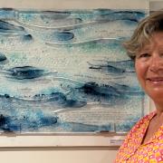Sue Tinkler won the People's Choice award for her glass panel All At Sea.