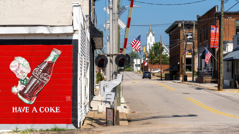 A wall mural and brick buildings in downtown Franklinton, North Carolina