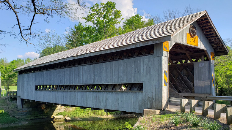 Exterior of Doyle Road Covered Bridge with greenery