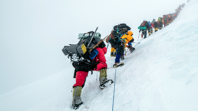 Group of climbers stuck on fixed ropes on Mount Everest