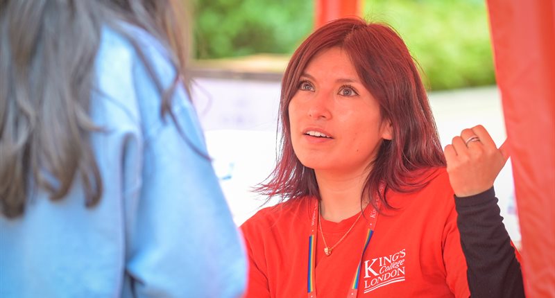 Residence staff talking to a student