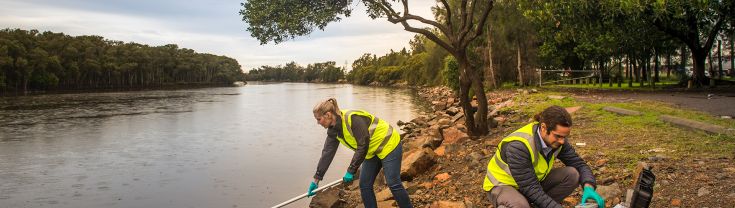 epa officers collecting water samples from a river