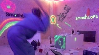 Baseballschläger gegen Monitor