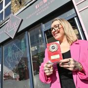 Elise Mongan outside her shop