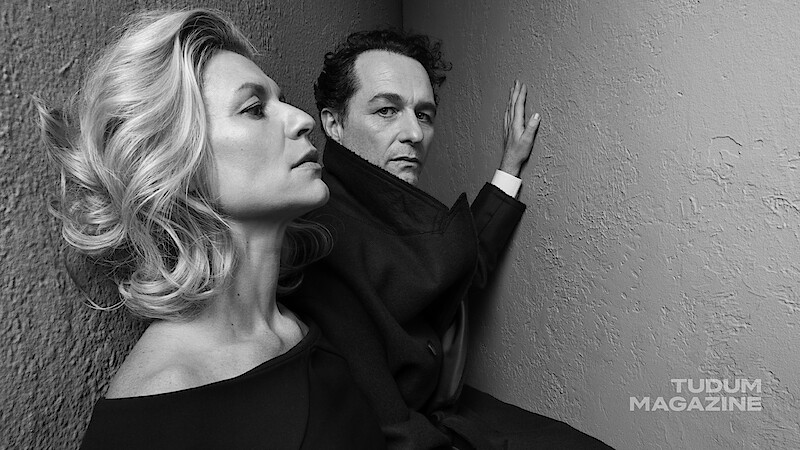 Claire Danes and Matthew Rhys pose for the camera wearing all black.