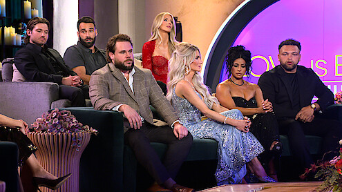 Chris Fusco, Alex Henderson, Jordan Faeth, Ashley Carpenter, Amber Morrison, Brittany Wicker, Devonta Anderson in formal attire sit on a set with modern decor and purple lighting, likely filming a television reunion or talk show.