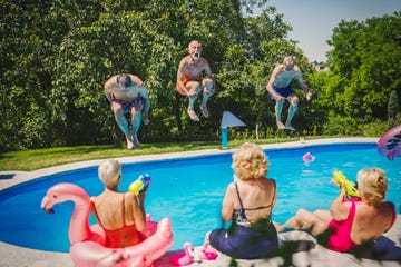 Seniors having summer fun active seniors having fun at swimming pool