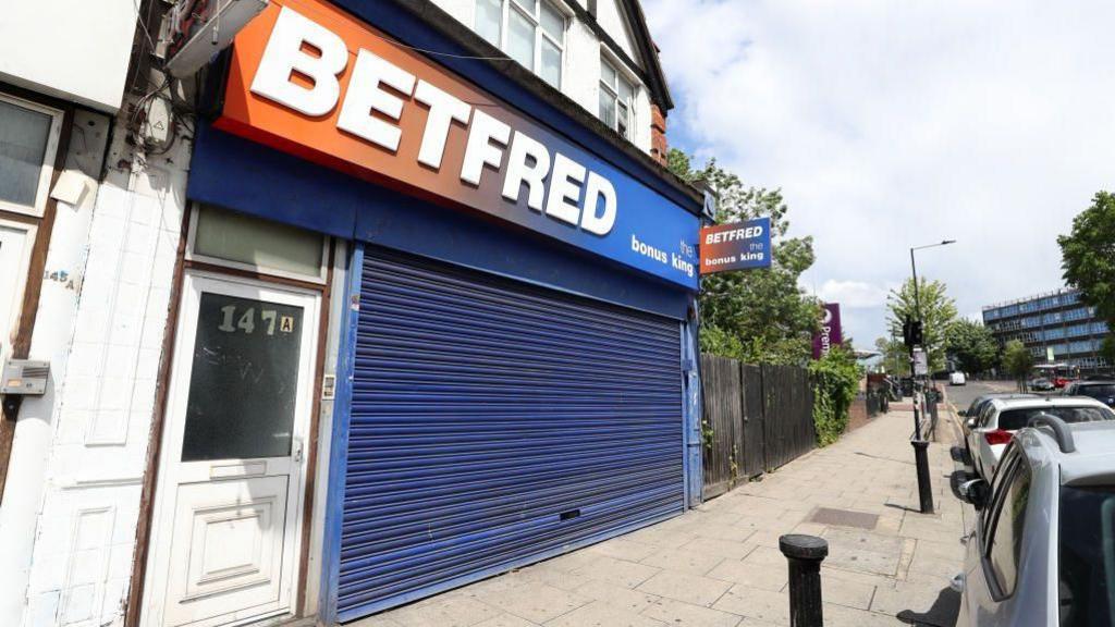 A closed Betfred betting shop