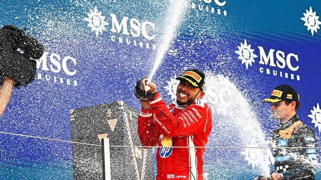 Lewis Hamilton spraying champagne on the Barcelona podium
