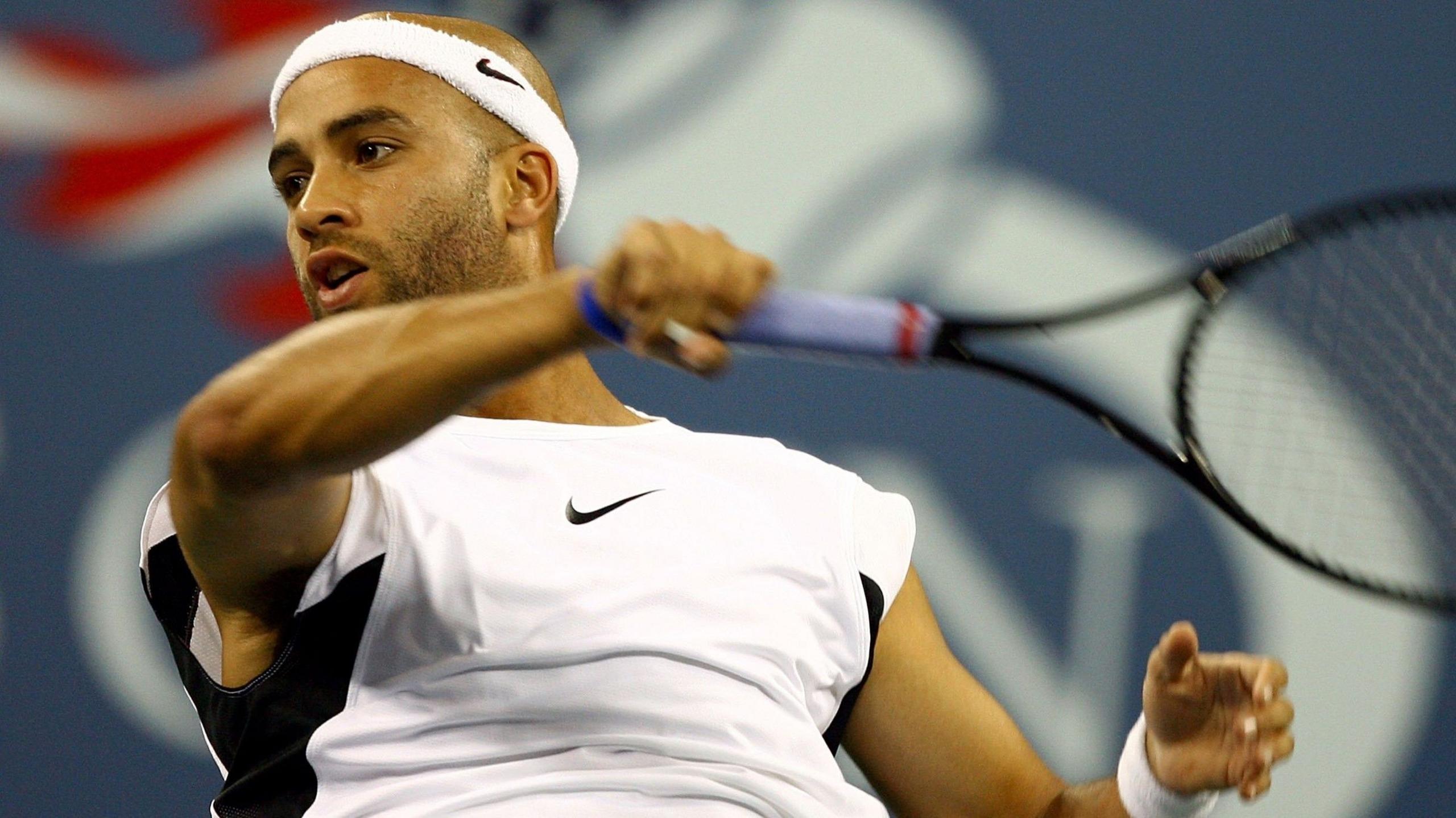 James Blake hits a forehand