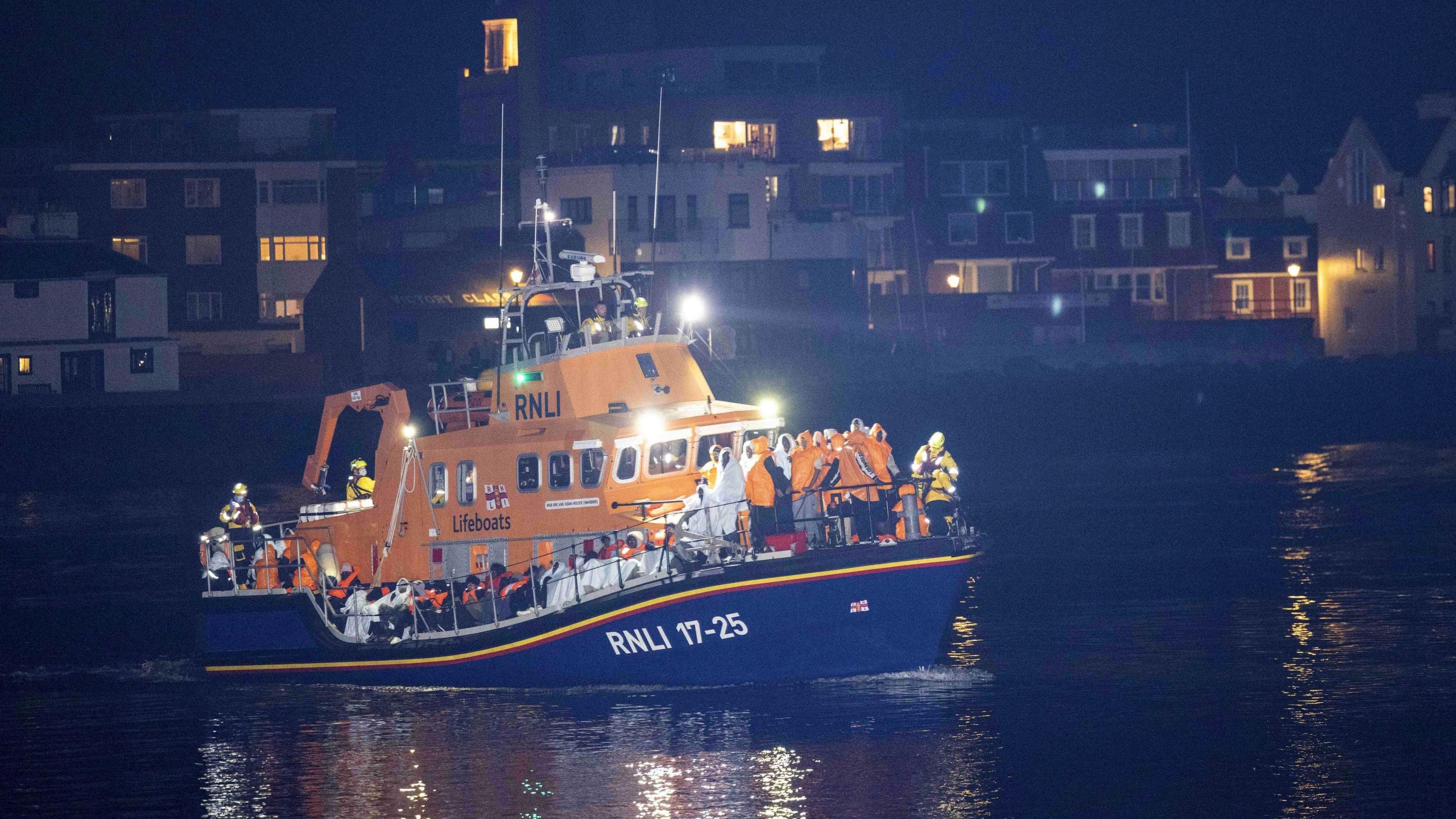 The migrants were brought into Gosport on board an RNLI boat