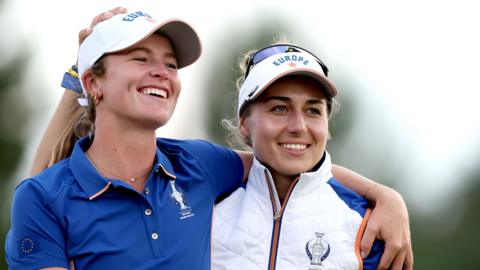 England's Mimi Rhodes and France's Nastasia Nadaud arm-in-arm at the Solheim Cup