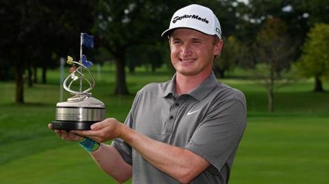 Sandy Scott with the the Nationwide Children's Hospital Championship trophy