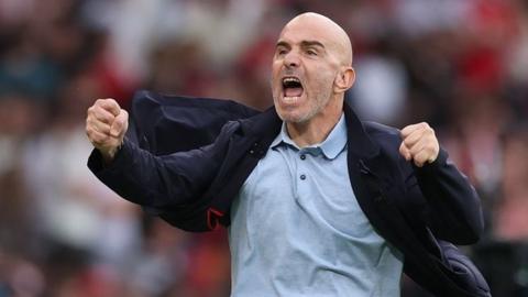Enzo Maresca celebrating with clenched fists