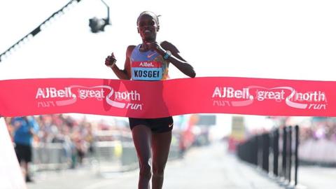 Eilish McColgan and Brigid Kosgei run side by side among the elite female runners at the start of the Great North Run