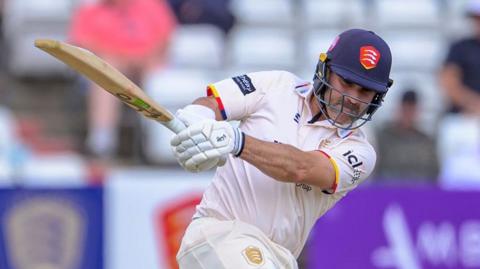 Dean Elgar makes a connection with the ball against Surrey