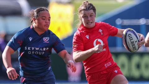 Wales co-captain Kate Williams carries the ball against USA