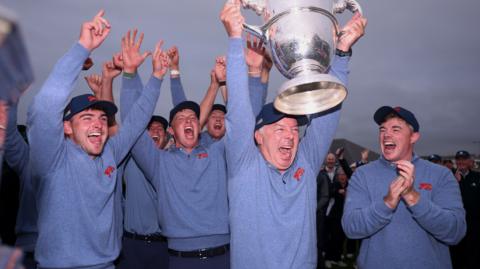 Dean Robertson lifts the Walker Cup