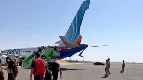 The Flydubai aircraft after its emergency landing appears to show it has sustained damage to its tail fin.