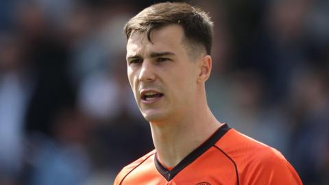 Joe Walsh in action for QPR last season