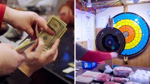 US currency exchanges hands in a bar. On the right a person spins a wheel of chance.