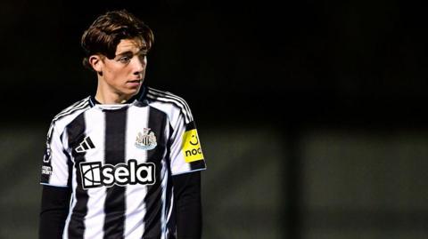 A photo of Harrison Ashby playing for Newcastle United Under-21s against Norwich City in the Premier League 2